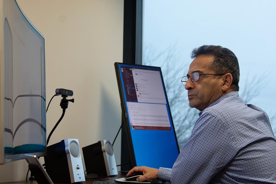 Shahab Mohaghegh working at the computer